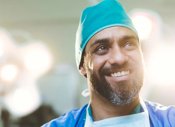 Surgeon in scrubs at a medical facility